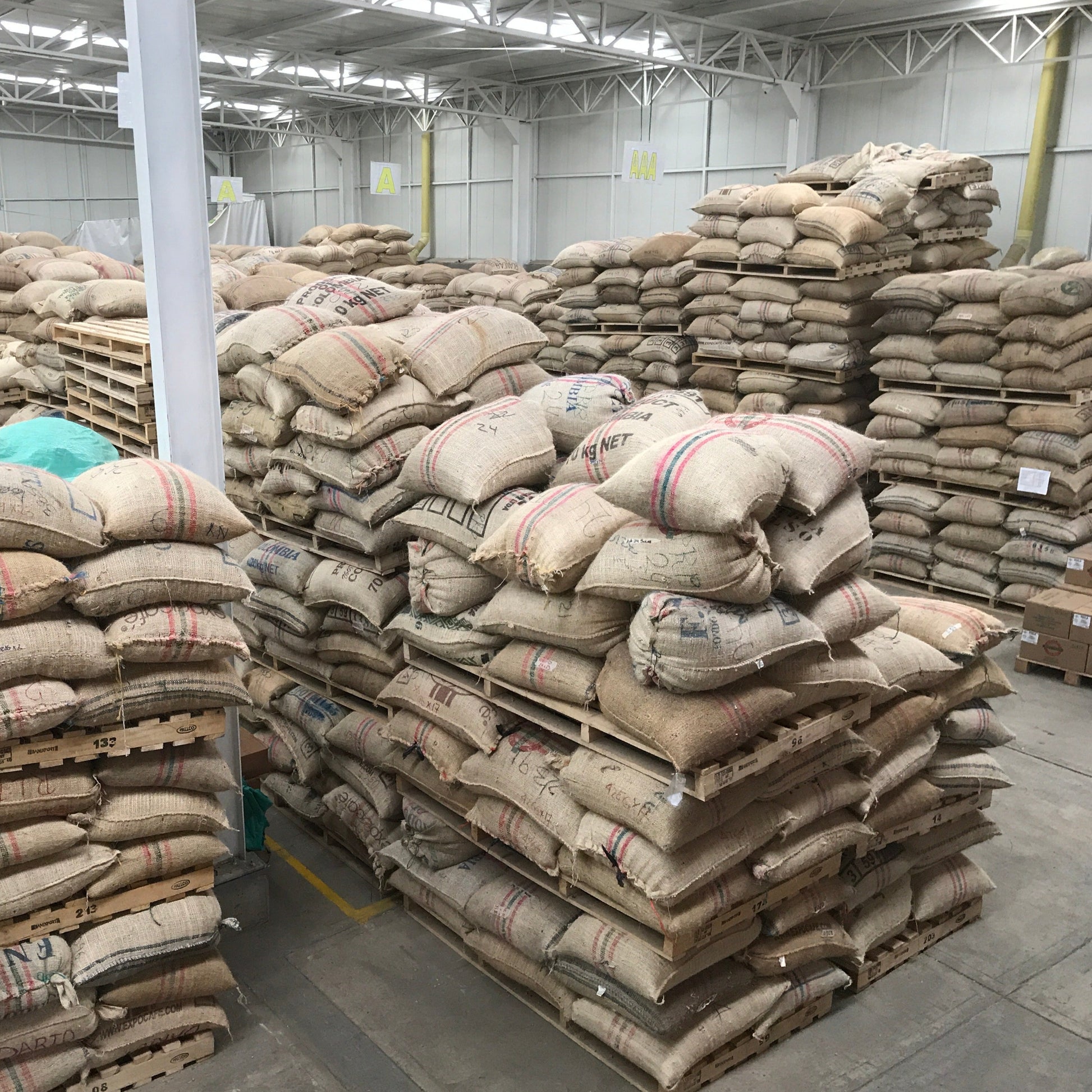 Bags of Casa Negra beans in warehouse