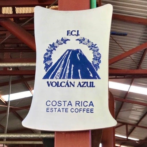 Volcan Azul sign at the farm 
