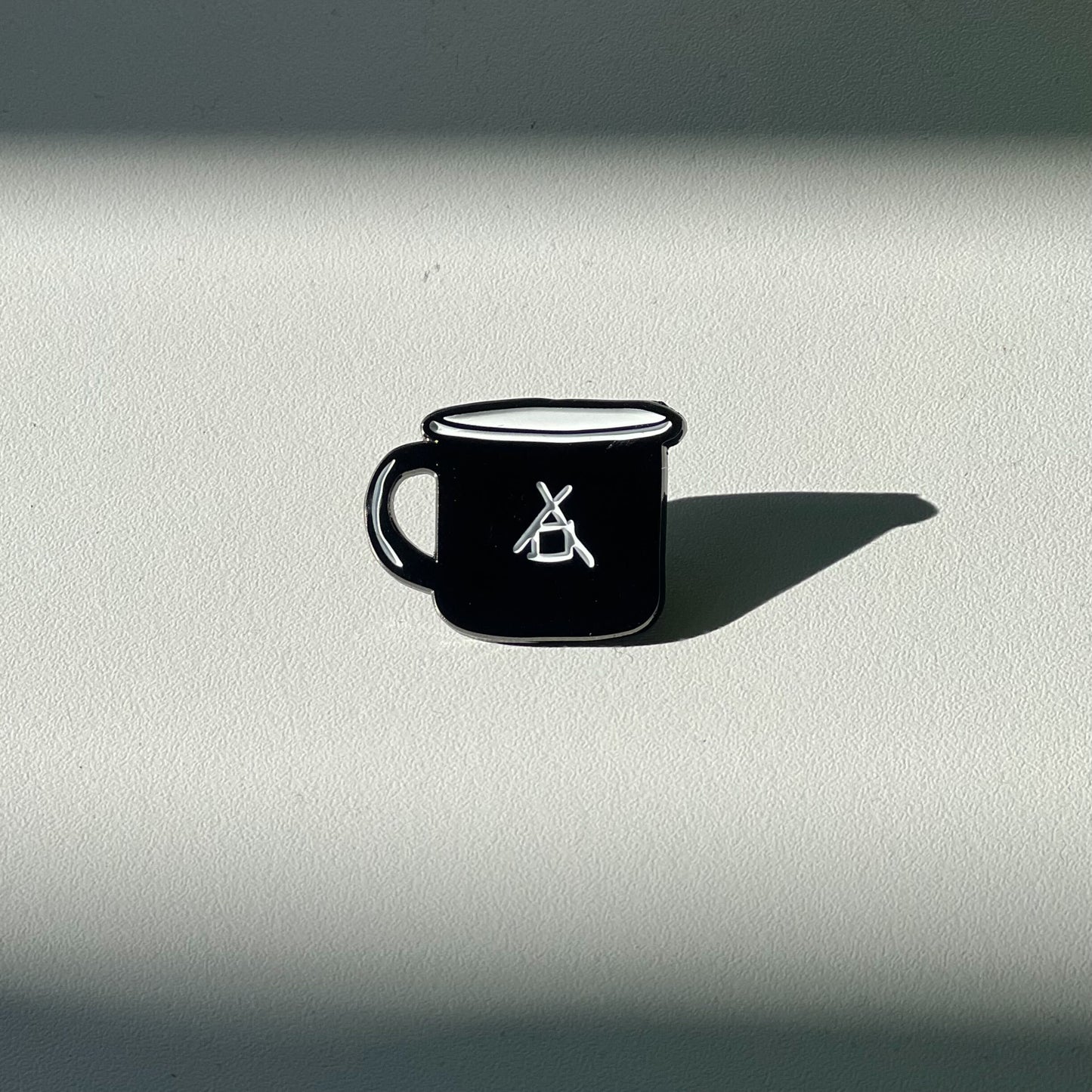 Pin in enamel cup design